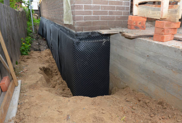 Happy homeowners after waterproofing job in Owosso